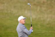 John Elway playing golf in 2024 (Image via Getty)